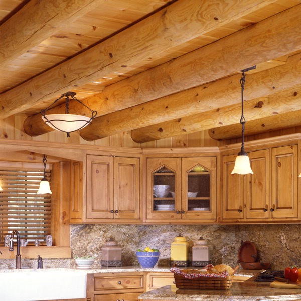 California log home great room with stone fireplace