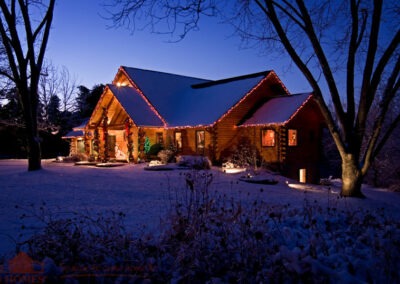 Godfrey Ranch exterior lit up at night