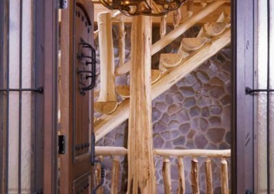 Columbia Station Log Home interior view showing tree post