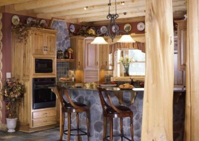 Columbia Station Log Home kitchen with bar seating