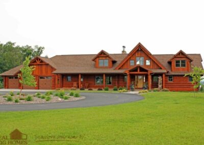 The Starview Log Home - exterior front driveway