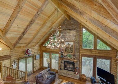 Green Gables log home loft view of great room