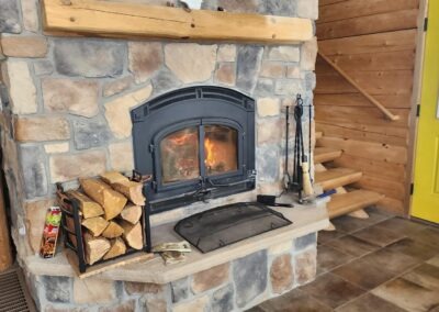 Stone fireplace in Colorado log cabin